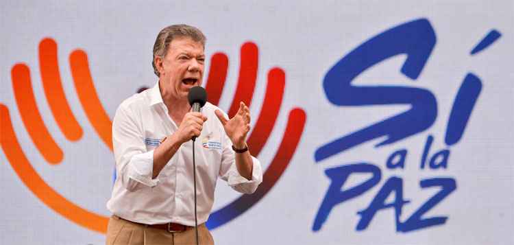 Presidente da Colômbia leva o Nobel da Paz  por esforços para acordo com as Farc - / AFP / LUIS ROBAYO 
