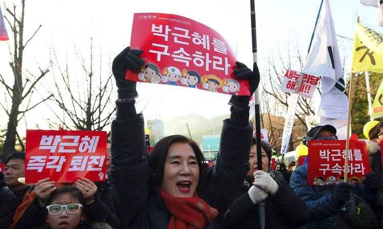 Após semanas de protestos, multidão celebra impeachment de presidente da Coreia - AFP/JUNG Yeon-Je 