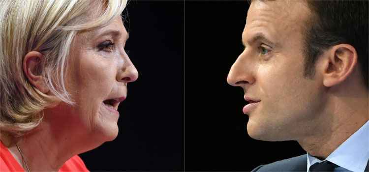 Macron é alvo de hackers na véspera do 2° turno da eleição presidencial francesa - AFP / GUILLAUME SOUVANT AND Eric FEFERBERG 