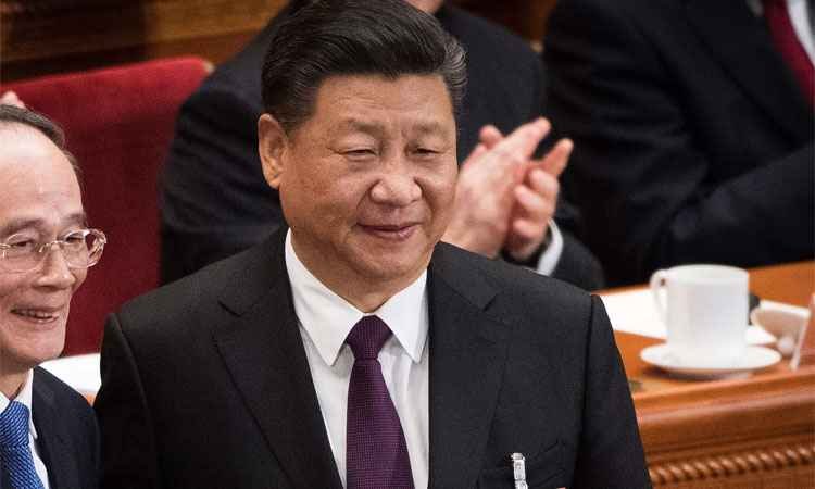 Xi Jinping é reeleito por unanimidade como presidente da China - AFP / NICOLAS ASFOURI 