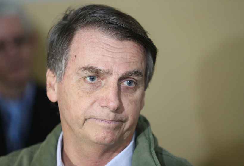 Bolsonaro diz que chegará a 'meio-termo' com Moro em caso de divergência -  / AFP / POOL / RICARDO MORAES 