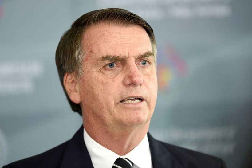 Bolsonaro diz que dar ministério para Magno Malta não é 'adequado' no momento - / AFP / EVARISTO SA