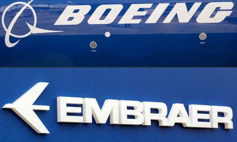 Acionistas da Embraer aprovam parceria estratégica com a Boeing - Eric Piermont/AFP