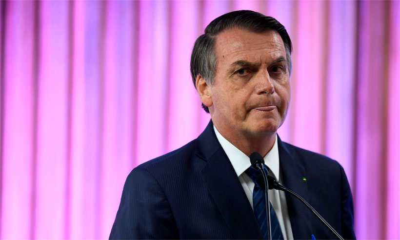 Porte de armas: Marcelo Freixo questiona se Bolsonaro é presidente ou lobista - Mauro Pimentel/AFP