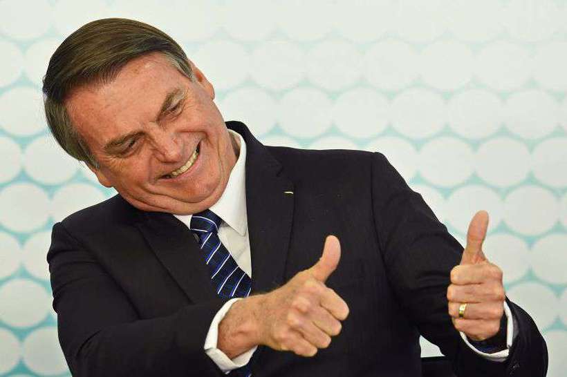 Bolsonaro sanciona lei que dá direito a posse de arma em área rural - Evaristo Sá/AFP