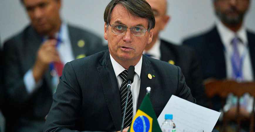 A CPI do óleo nas praias  e Bolsonaro no Mercosul - Carl Souza/AFP