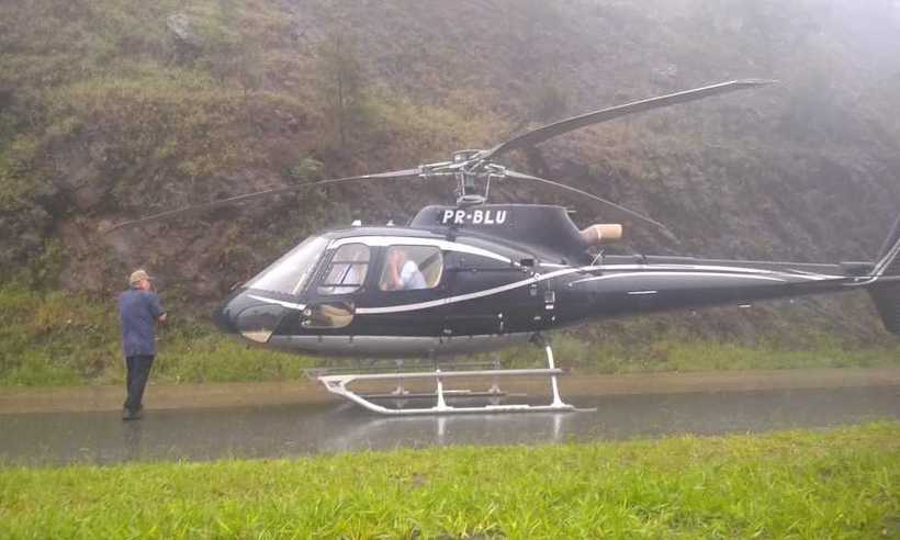 Helicóptero faz pouso forçado na BR-040 por causa da chuva - Reprodução