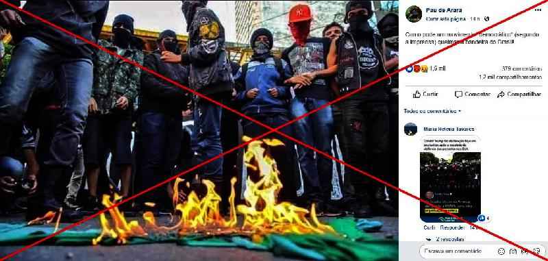 A imagem de homens mascarados queimando uma bandeira do Brasil foi tirada em 2016