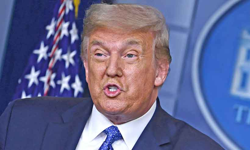 Trump doou ao Brasil doses de cloroquina. Presente de grego? - Brendan Smialowski/AFP