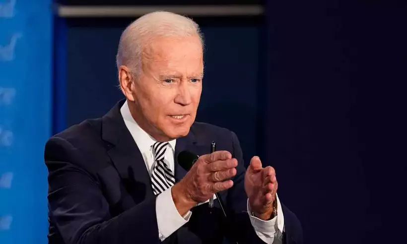 Biden terá dificuldades para aprovar propostas, diz consultoria britânica - Morry Gash / POOL / AFP