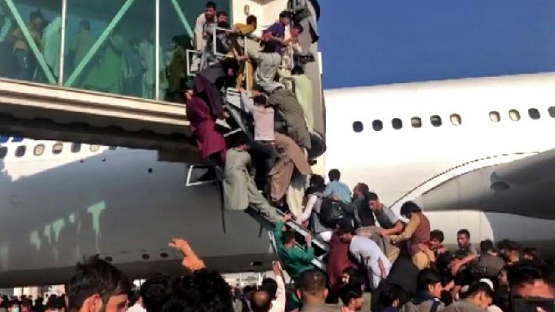 Brasil avalia receber afegãos em programa de visto rápido a refugiados - BBC