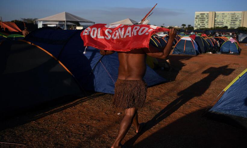 Bolsonaro: oposição ao Marco Temporal vem de fora, para inviabilizar agronegócio - CARL DE SOUZA / AFP