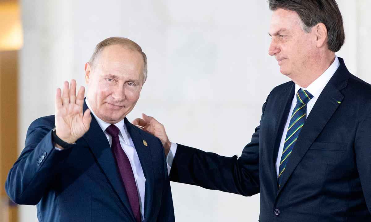 Encontro de Bolsonaro com Putin vira centro das atenções mundiais - Pavel Golovkin/AFP