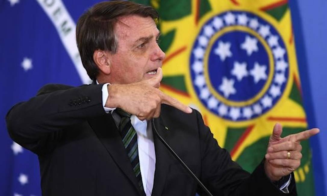 Bolsonaro associa queda de homicídios ao armamento da população - Evaristo Sá/AFP