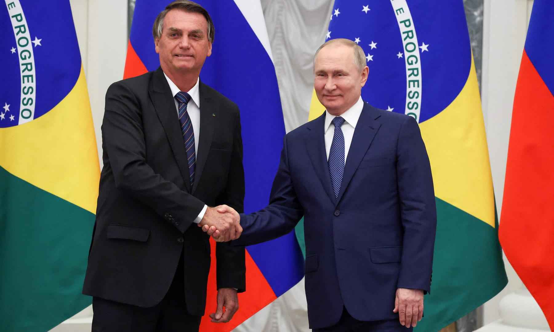 Na guerra, Bolsonaro ama Putin, que manda em Maduro, que é amigo de Biden - Mikhail Klimentyev / SPUTNIK / AFP