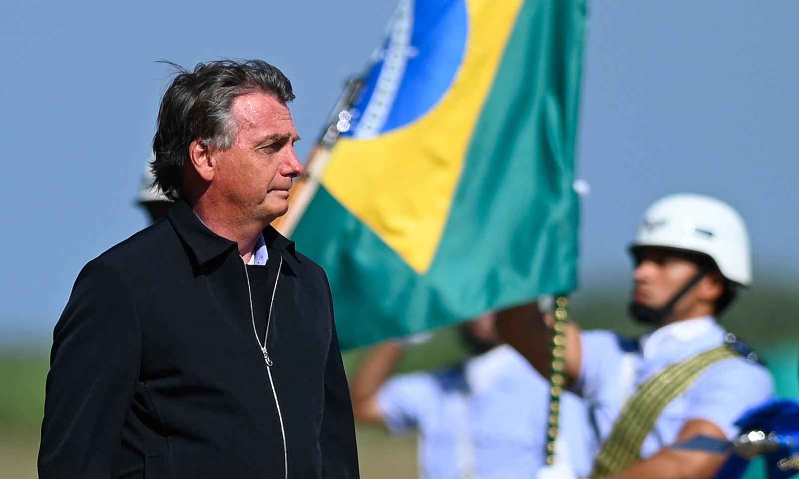 O que o Bolsonaro do indulto tem a ensinar à propaganda lulista em crise - ANDRE BORGES / AFP