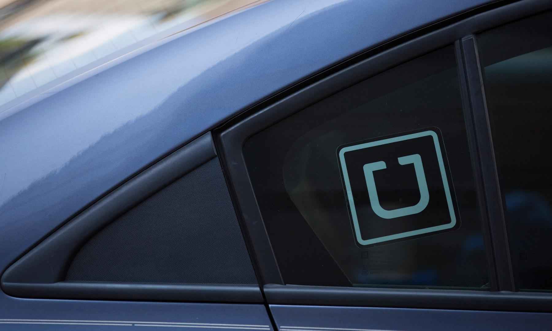 Uber e sua marca de alto renome - Alastair Pike / AFP