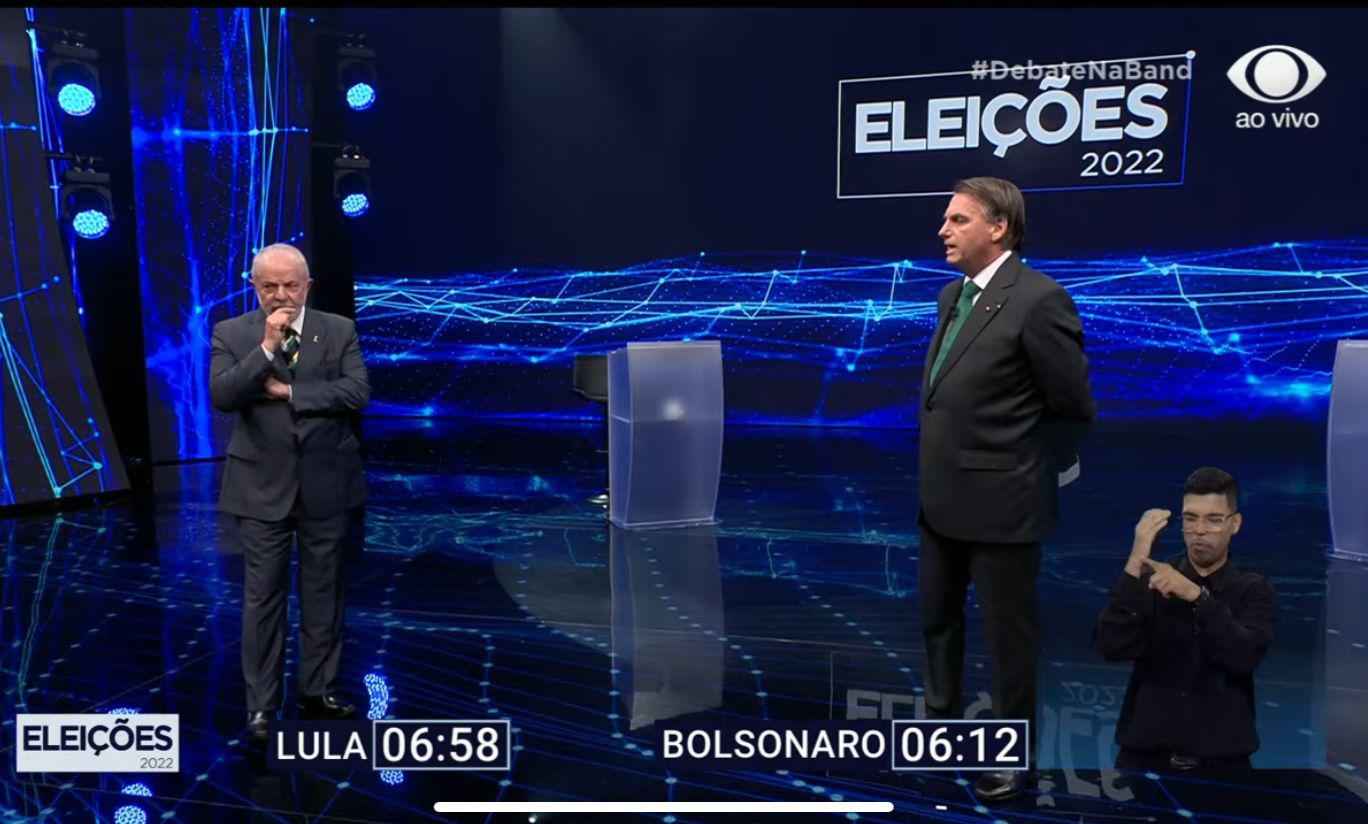 Bolsonaro lê para Lula decisão do TSE que retirou fala do programa do PT - Tv Band/Reprodução
