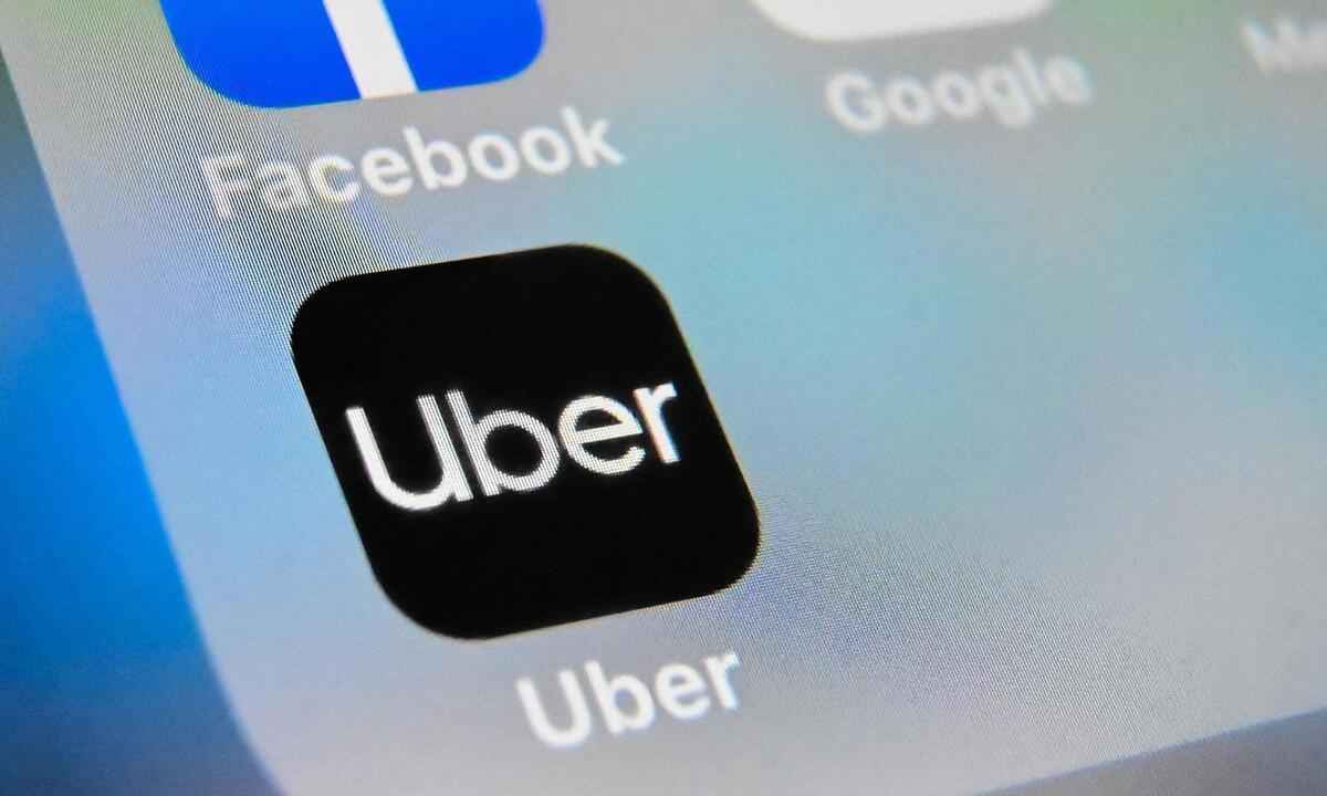 Uber vai adicionar modalidade táxi em BH, e motoristas reclamam - DENIS CHARLET / AFP