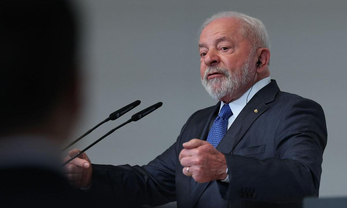 Lula sobre Bolsonaro na pandemia: 'Uma hora ele terá de ser julgado' - Thomas Coex/AFP