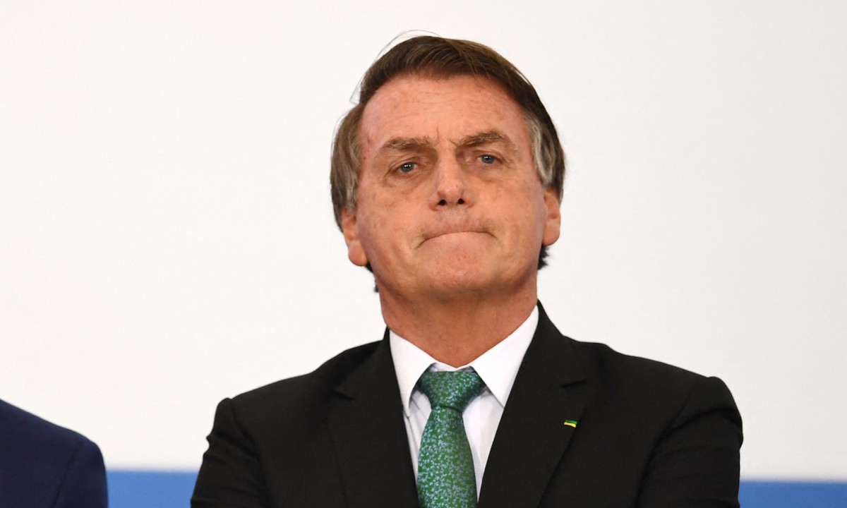 Bolsonaro sacou R$ 644 mil para pagamentos em espécie por 'segurança' - Photo by EVARISTO SA / AFP