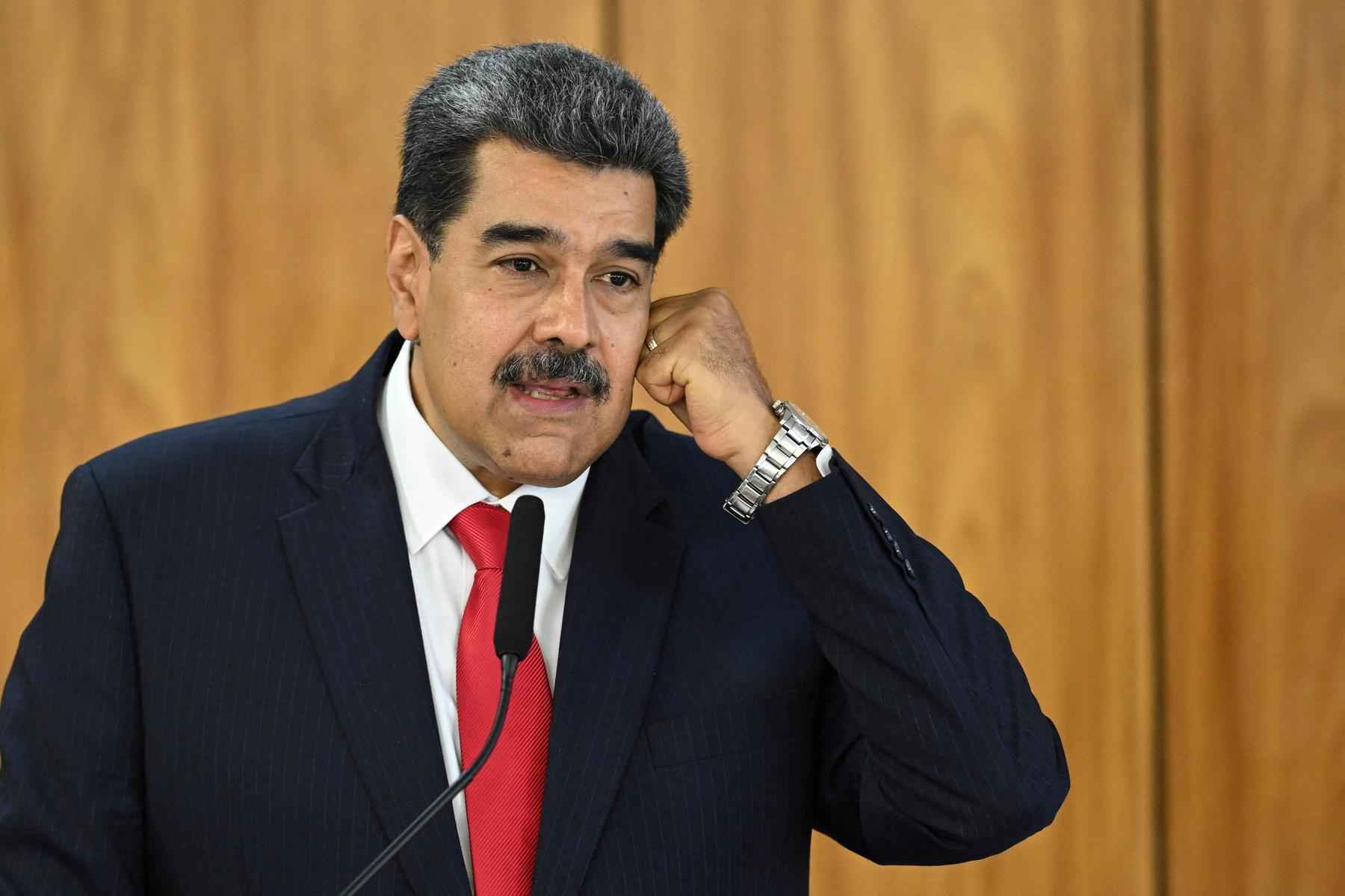 Venezuela deve apresentar plano de pagamento de dívida de US$1 bi ao Brasil - EVARISTO SA/AFP