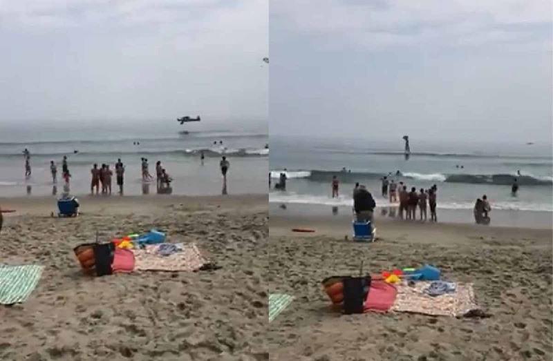 Vídeo flagra avião de pequeno porte caindo em praia ao lado de banhistas - (Reprodução / Redes Sociais)