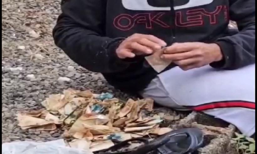Vídeo: moradores encontram R$ 15 mil boiando em ribeirão - Redes Sociais/Reprodução
